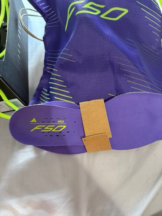 Botas Fútbol F50 Elite AG Morado/Verde.