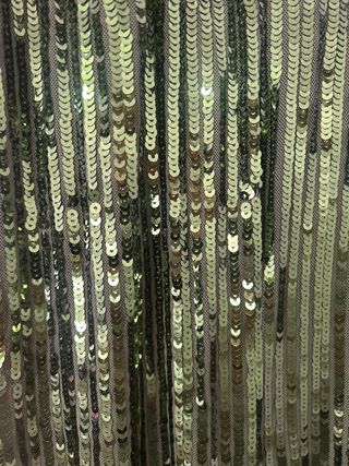 Mono Mango lentejuelas verde, cremallera trasera.