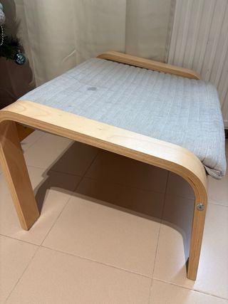 Reposapiés de tela y madera