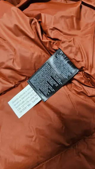 The North Face Plumas Naranja y Negro