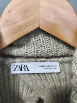 Chaleco de punto cuello alto