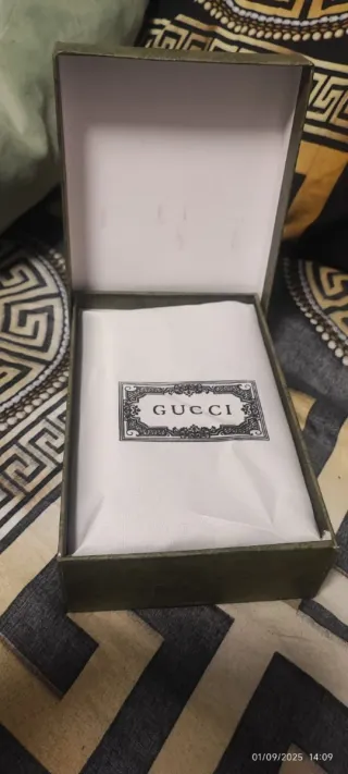 Bolso Gucci GG Canvas con detalle