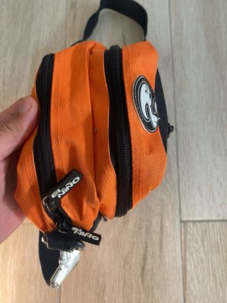 Riñonera El Niño Negra y Naranja Original