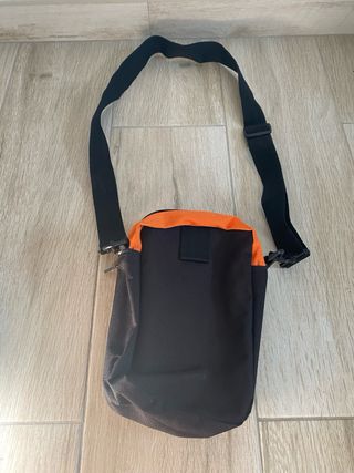 Riñonera El Niño Negra y Naranja Original