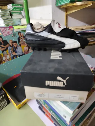 Botas de fútbol Lotto doradas y verdes