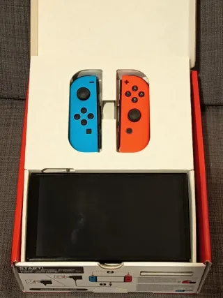 Nintendo Switch OLED + 4 Juegos