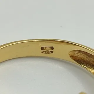 00544 ANILLO AJUSTABLE CON PIEDRA MORADA ORO18K