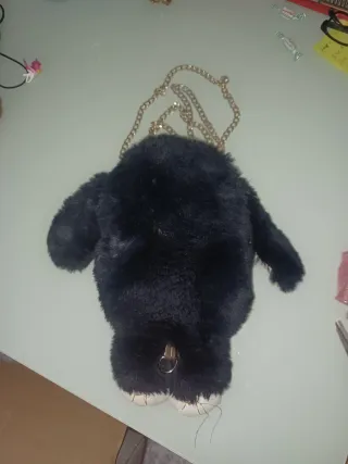 Bolso mochila conejo negro y dorado