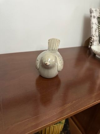 Adorno pájaro cerámica.
