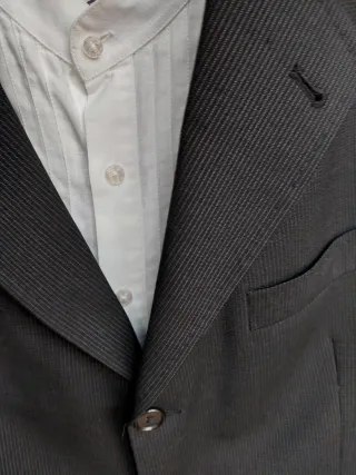 Traje masculino de chaqueta y pantalón negro