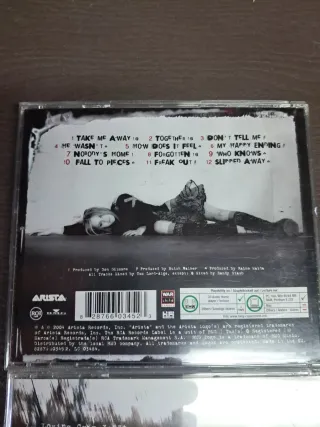 CDs Avril Lavigne: Under My Skin y Let Go