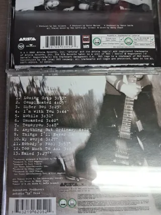 CDs Avril Lavigne: Under My Skin y Let Go