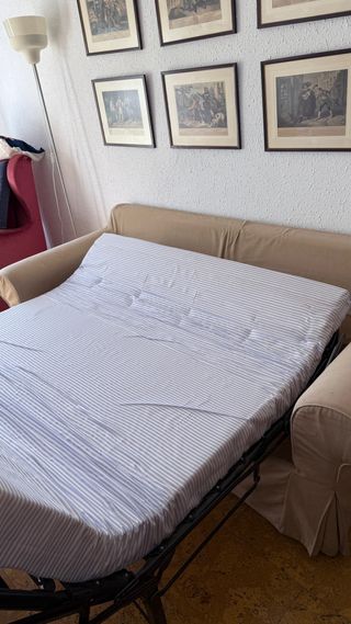 Sofá cama beige de tela