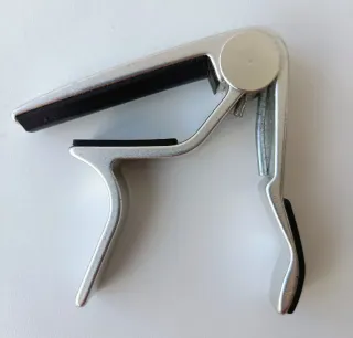 Capotraste transpositor Jim Dunlop para Guitarra A