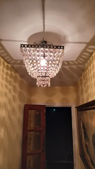 Lampada a sospensione in vetro e metallo