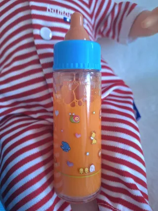 Muñeco Corolle con cuco y accesorios