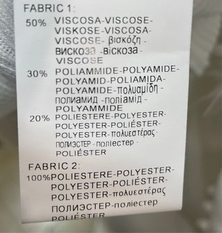 Abito donna bianco con piume