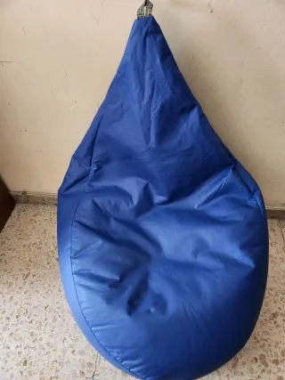 Puf azul de piel sintética