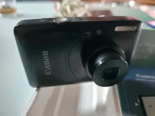 Cámara Digital Canon IXUS 100 IS + Accesorios