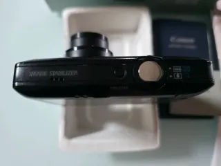 Cámara Digital Canon IXUS 100 IS + Accesorios