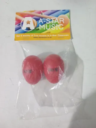 2 Huevos Maracas Musicales Rojos