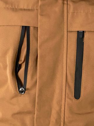 Cazadora térmica marrón como nueva