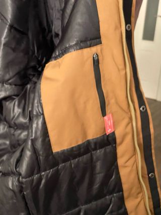 Cazadora térmica marrón como nueva