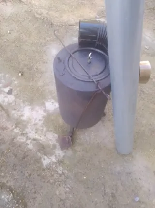 Estufa leña pequeña con tubo