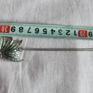 Cadena plata y mariposa colgante