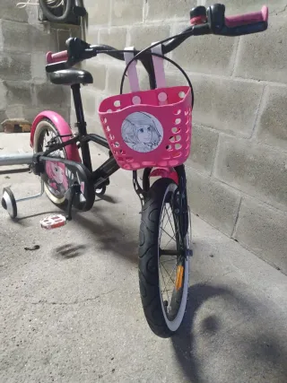 Bicicleta infantil rosa y negra