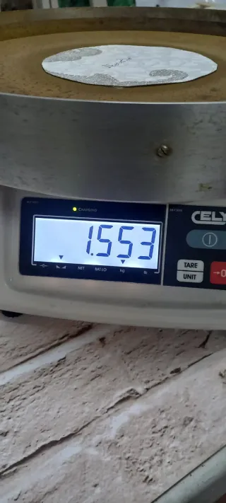 Eguzkilore artesanal en marco circular y cristal