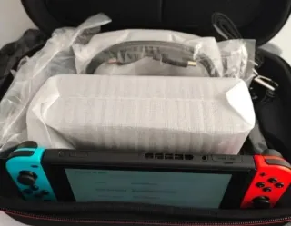 Nintendo Switch Azul/Rojo + Juego