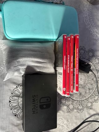 Nintendo Switch Roja y Azul + Juegos