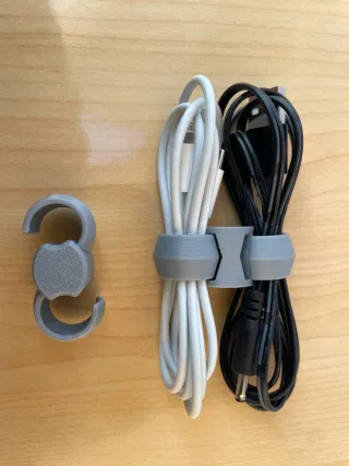 Sujetacables organizadores de plástico gris