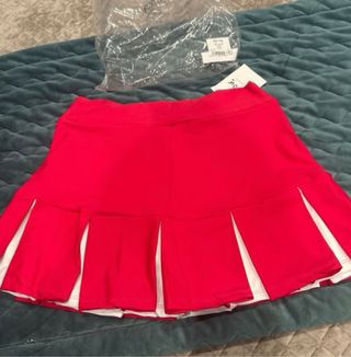 Falda deportiva Dylow fucsia y blanca