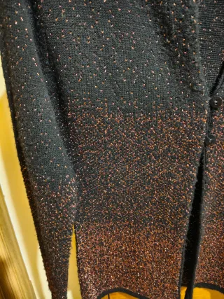 Chaqueta Hennes fiesta negra y dorada