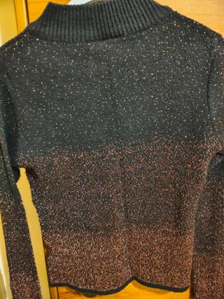 Chaqueta Hennes fiesta negra y dorada