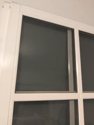 Puerta aluminio con palillería