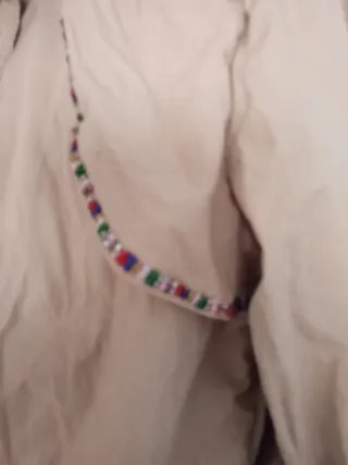 Chaqueta beige cuello alto