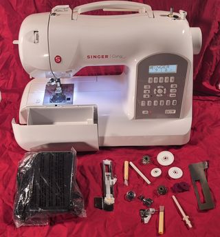 Máquina coser computerizata