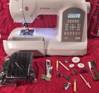 Máquina coser computerizata