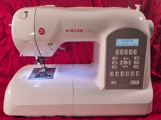 Máquina coser computerizata