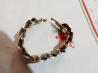 Lote pulseras y anillos Uno de 50, plata