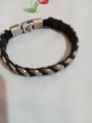 Lote pulseras y anillos Uno de 50, plata