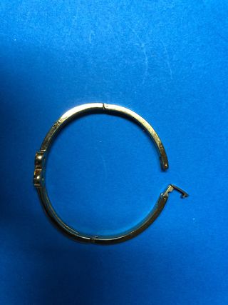 Pulsera dorada con infinito y brillantes