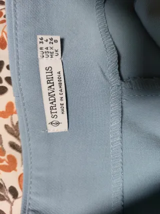 Pantalón de traje azul de talle alto