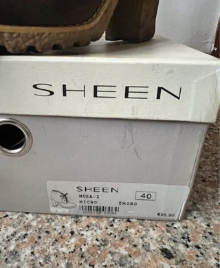 Stivaletti marroni con tacco e pelliccia