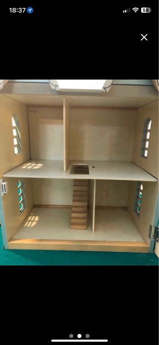 Casa de muñecas de madera