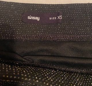 Falda tubo negra con brillos