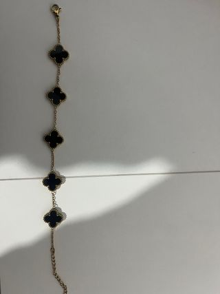 Pulsera Van Cleef & Arpels Negra y Dorada